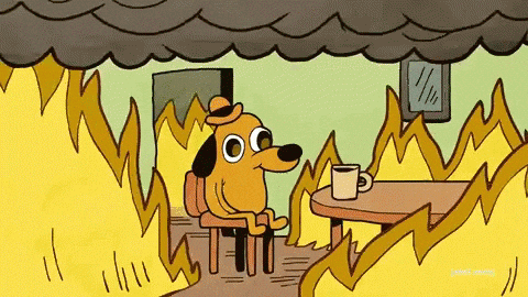 Cartoon dog calmly sipping coffee in a burning room — 'this is fine'
